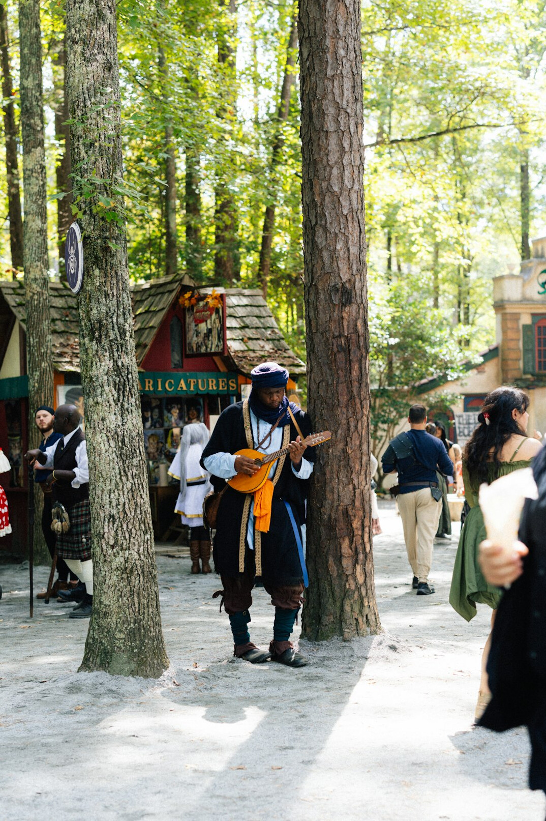 People celebrating a traditional folk festival in a Polish village