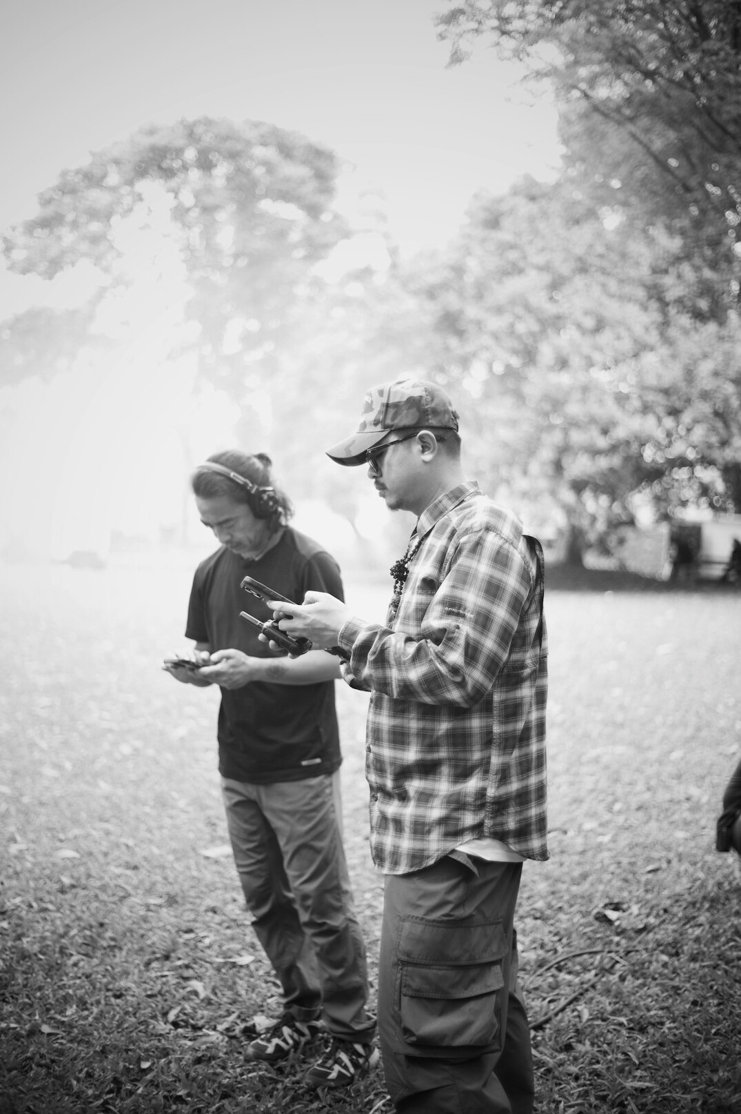Small group learning documentary photography outdoors with an instructor